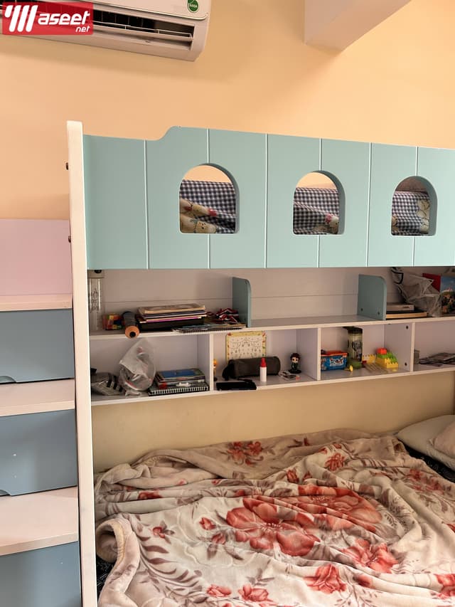 A two-storey bed with two medical mattresses for urgent sale