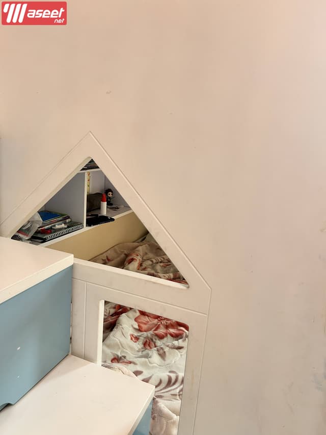 A two-storey bed with two medical mattresses for urgent sale